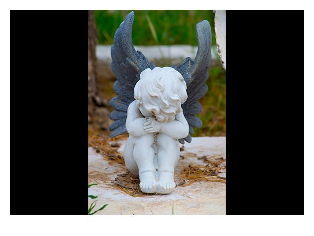 Child Angel Statue in Old Cemetary